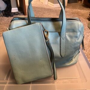 Fossil bag with cross body strap. beautiful soft blue. Matching fossil pouch